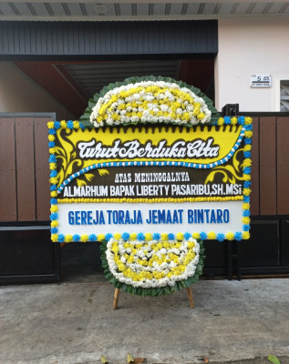 Papan Bunga Duka di Losung